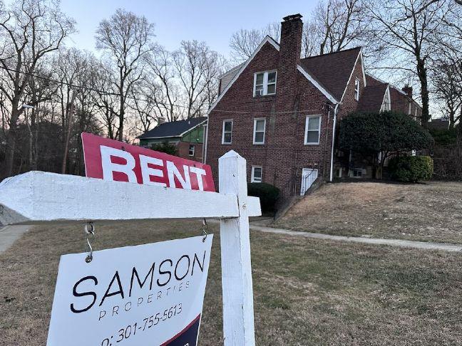 A-sign-lists-a-home-for-rent-in-Maryland